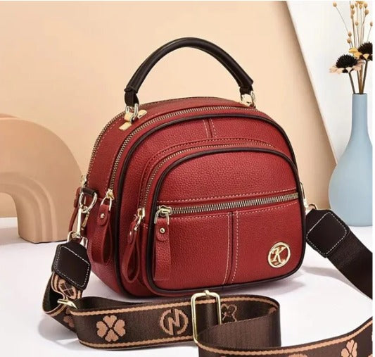 Bolso premium tipo bandolera + caja