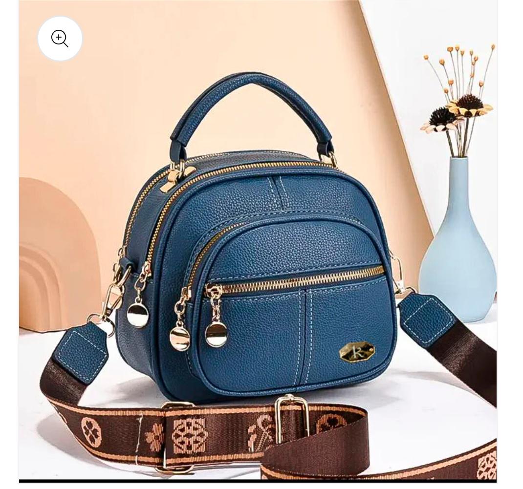 Bolso premium tipo bandolera + caja